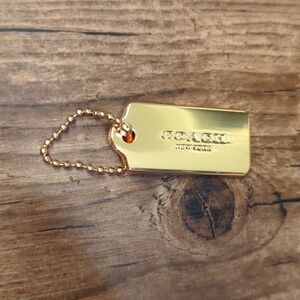 Coach Metal Gold Tone Bag Tag Key Chain